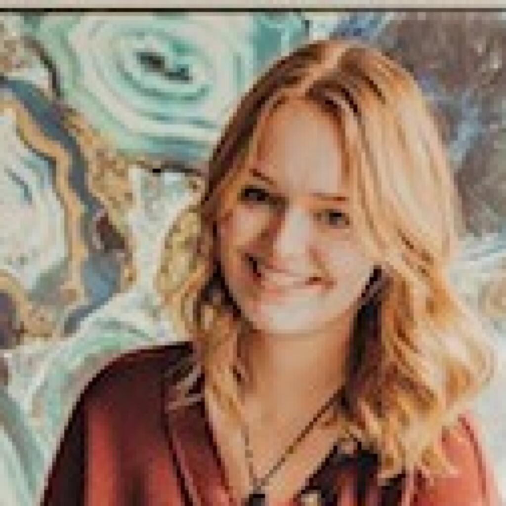 Ali Paradites hairstylist at Escape Salon Suites in Hudson Wisconsin