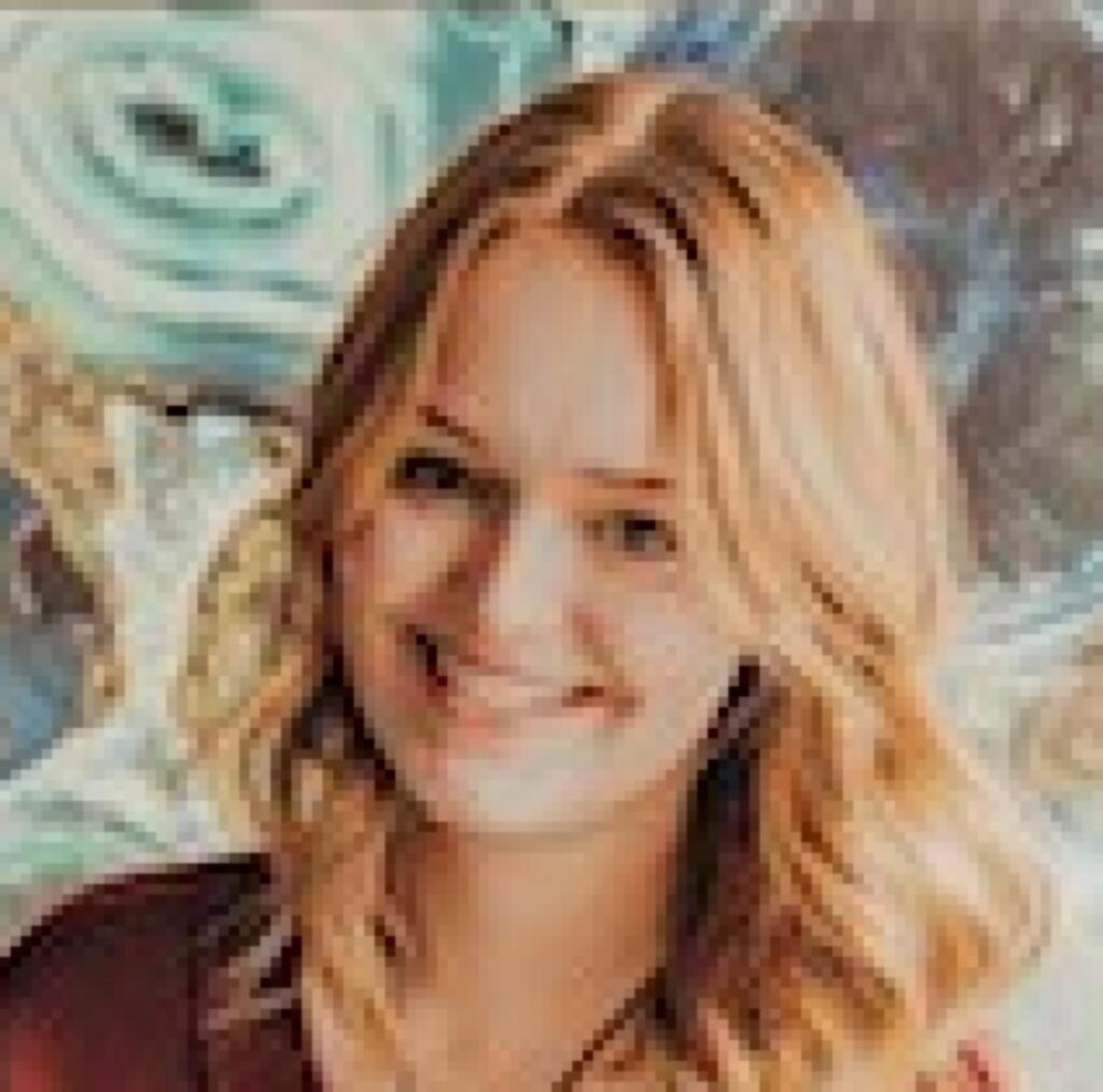 Ali Paradites hairstylist at Escape Salon Suites in Hudson Wisconsin